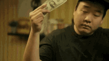 chinese-guy-with-one-dollar-dance.gif