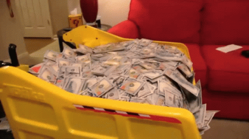 dump truck of money.gif