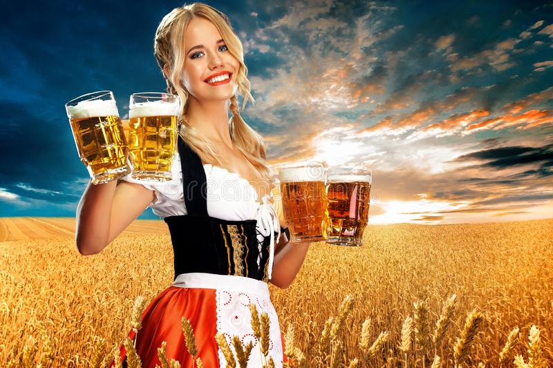 half-length-portrait-young-sexy-blonde-big-breast-wearing-black-dirndl-white-blouse-holding-be...jpg
