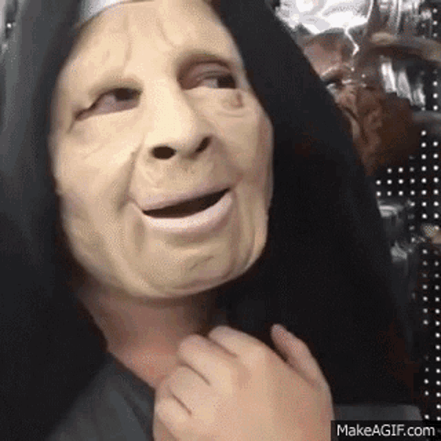 halloween-mask-finger.gif