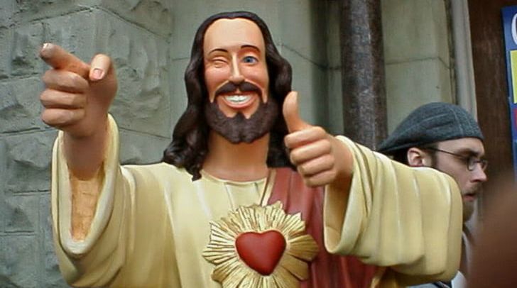 imgbin-jesus-christ-the-redeemer-dogma-buddy-christ-statue-jesus-christ-statue-beside-man-Qi4v...jpg