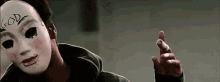 the-purge-masked-man.gif