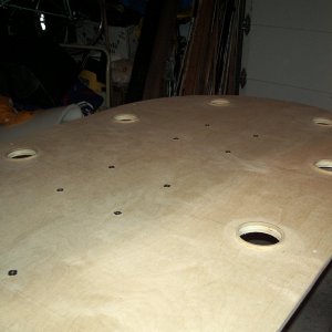 Raised cup holder holes