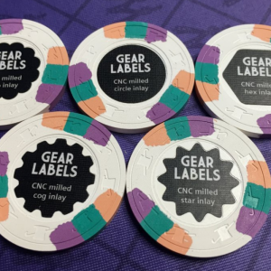 Chris Gear unveils new tech - milled shaped labels!!! - photo by inca 911