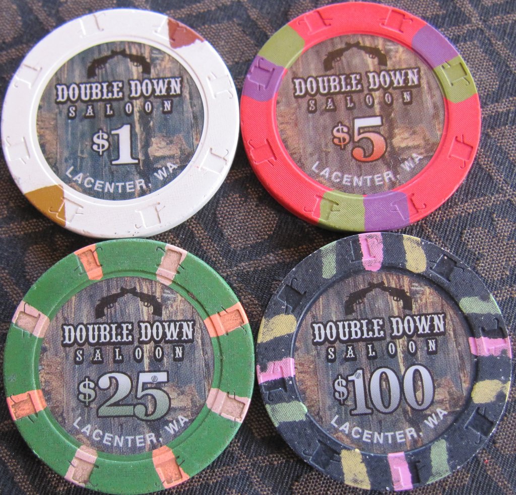 Close ups for the four types of Double Down Saloon chips in the set