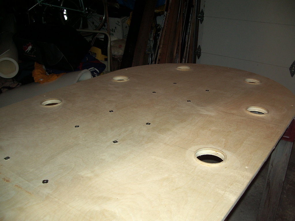 Raised cup holder holes