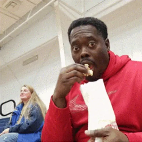 serious-man-eating-popcorn-u2w6ifdmmx208w35.webp