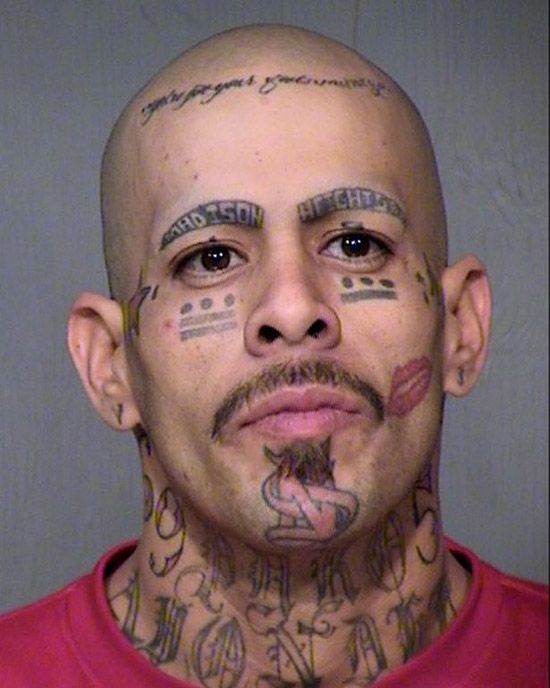 People-with-WTF-face-tattoos11.jpg