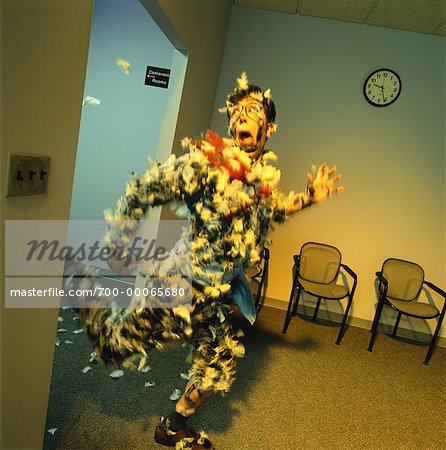 700-00065680em-Businessman-Covered-in-Tar-and-Feathers-Running.jpg